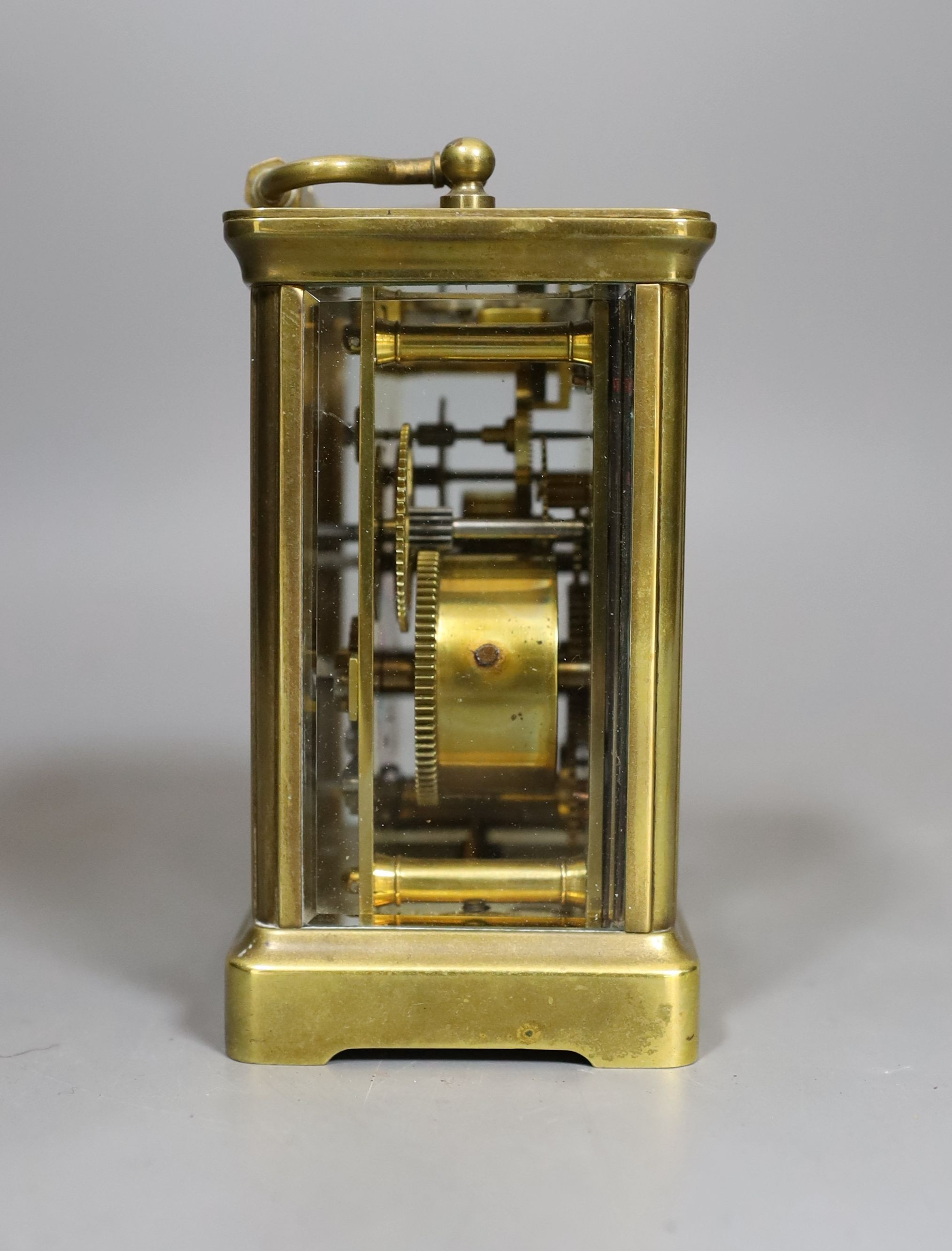 A carriage clock with alarm, 10.5 cms high.